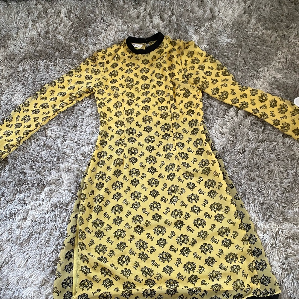 yellow and black tunic top